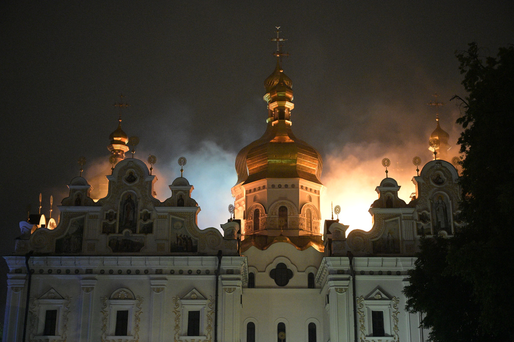 The roof of the Dormition Cathedral of the Kyiv-Pechersk Lavra is on fire during the overnight Russian attack on Kyiv, Ukraine Monday, June 15, 2026. (AP Photo/Danylo Antoniuk)