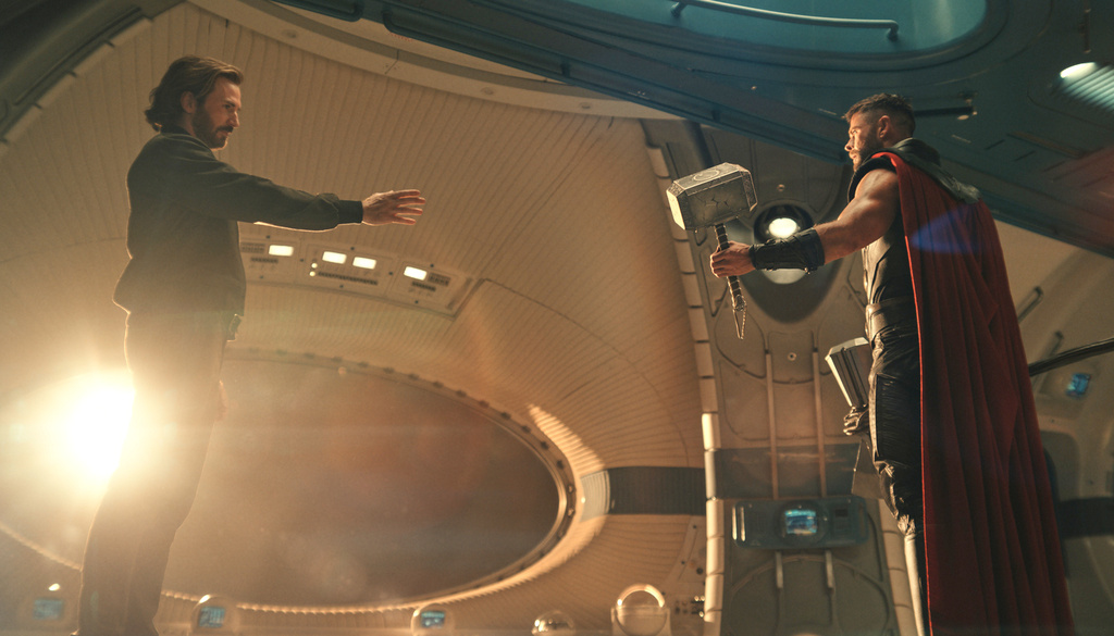 This image released by Marvel shows Chris Evans, as Steve Rogers, left, and Chris Hemsworth, as Thor, in a scene from "Avengers: Doomsday." (Marvel via AP)