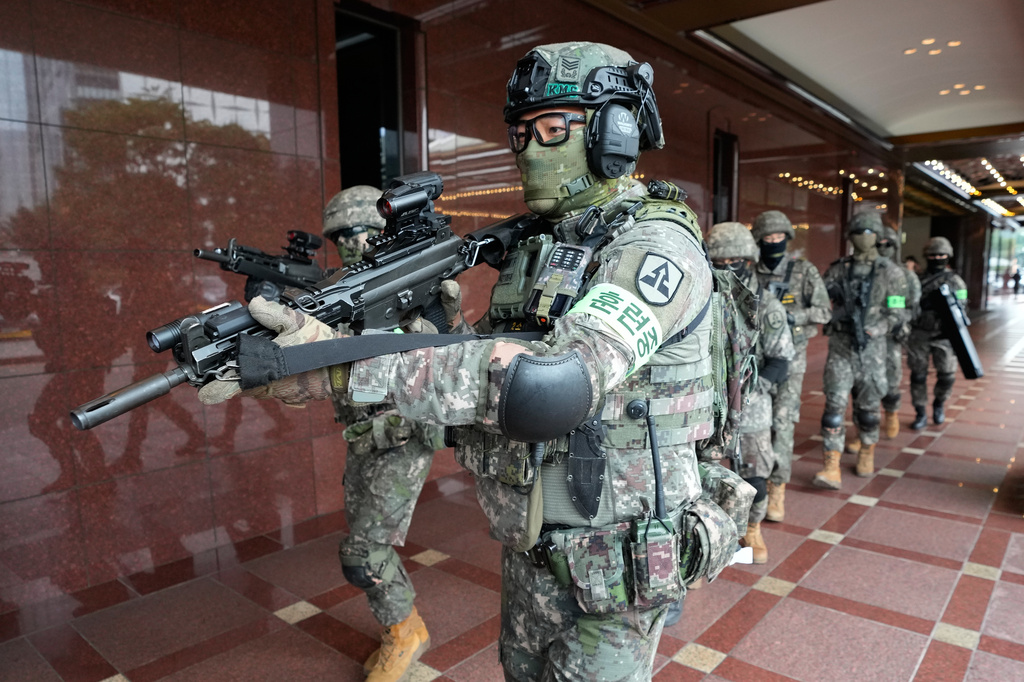 South Korea army soldiers take part in an anti-terror drill as a part of the Ulchi Freedom Shield military exercise between the U.S. and South Korea in Seoul, South Korea, Wednesday, Aug. 19, 2026. (AP Photo/Ahn Young-joon)