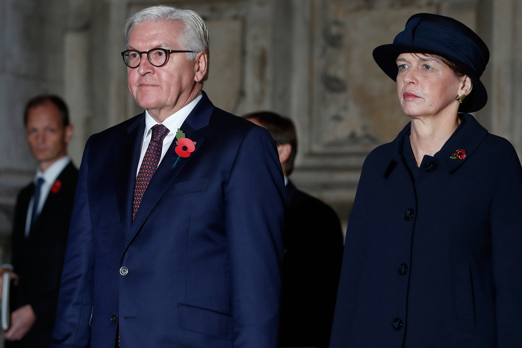FILE - German President Frank-Walter Steinmeier, front left, and his wife, Elke Budenbender, right, leave Westminster Abbey in London, England, Nov. 11, 2018. (AP Photo/Alastair Grant, File)