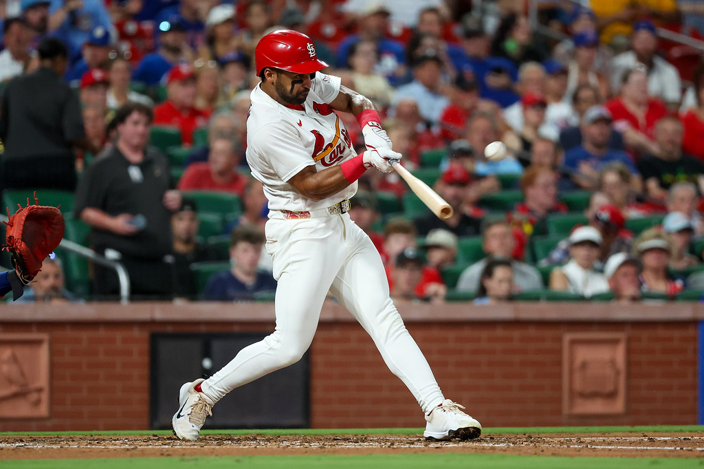 St. Louis Cardinals' José Fermín hits a solo home run during the second inning of a baseball game against the Chicago Cubs, Monday, July 27, 2026, in St. Louis. (AP Photo/Scott Kane)
