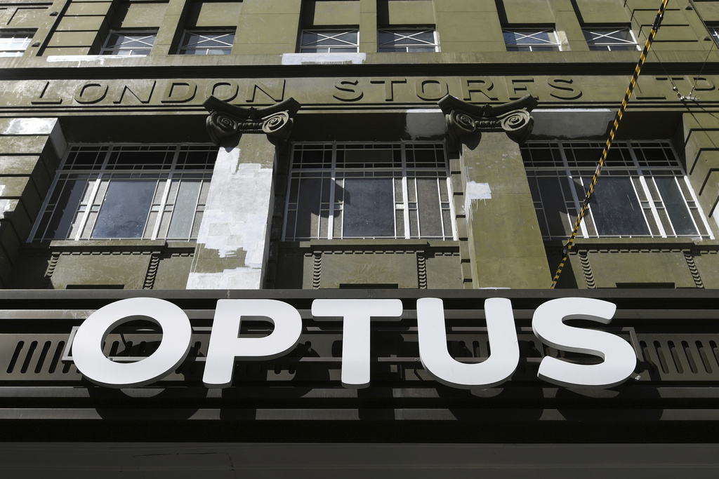 The signage is seen at an Optus store in Melbourne, Australia, Monday, Sept. 22, 2025. (Erik Anderson/AAP Image via AP)