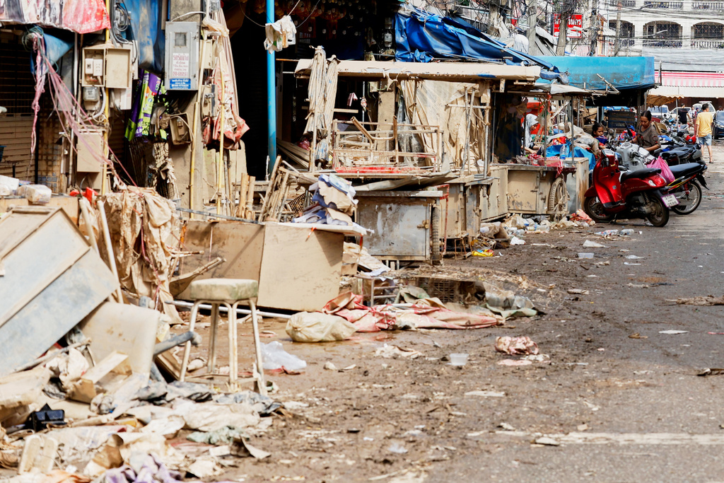 The damaged shops are seen following flooding in Songkhla province, southern Thailand, Saturday, Nov. 29, 2025. (AP Photo/Sarot Meksophawannakul)
