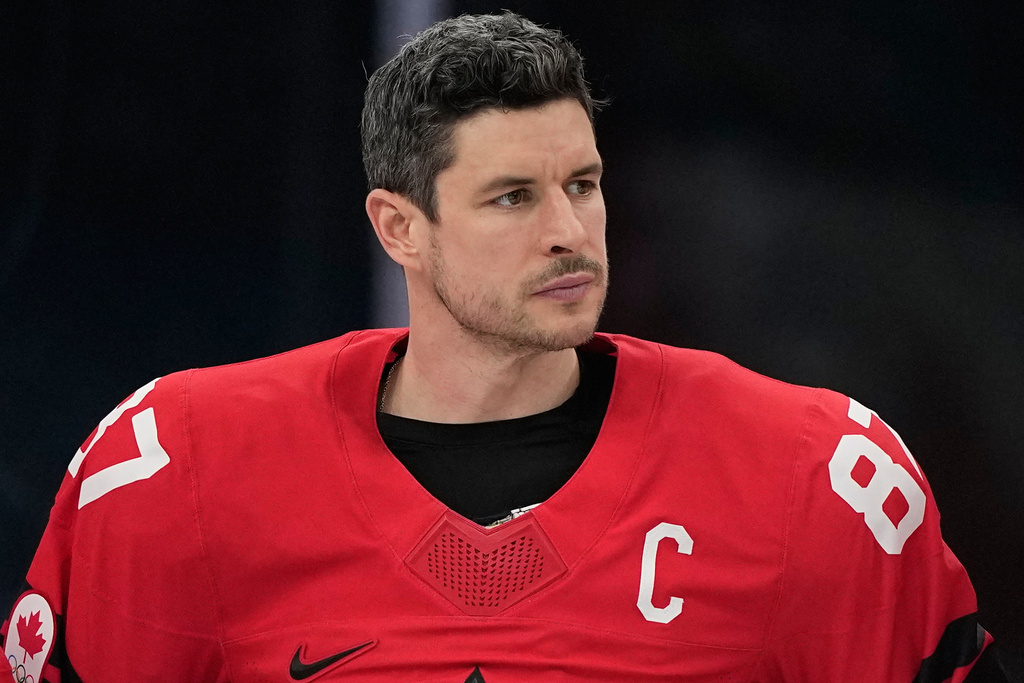 Canada's Sidney Crosby (87) reacts after Canada lost to the United States in a men's ice hockey gold medal game between Canada and the United States at the 2026 Winter Olympics, in Milan, Italy, Sunday, Feb. 22, 2026. (AP Photo/Petr David Josek)