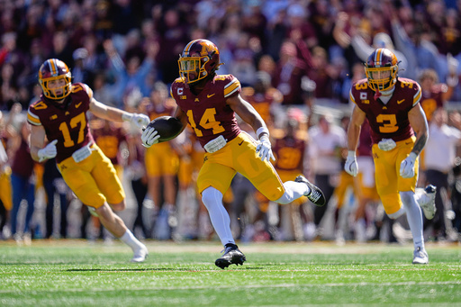 Minnesota defensive back Kerry Brown (14) returns an interception during the first half of an NCAA college football game against Rutgers, Saturday, Sept. 27, 2025, in Minneapolis. (AP Photo/Abbie Parr) Minnesota defensive back Kerry Brown (14) returns an interception during the first half of an NCAA college football game against Rutgers, Saturday, Sept. 27, 2025, in Minneapolis. (AP Photo/Abbie Parr)