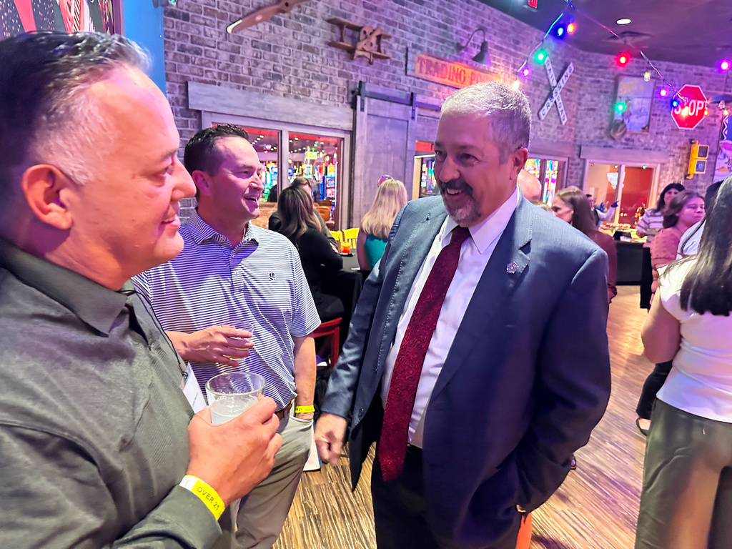 Bernalillo County District Attorney Sam Bregman, one of two Democratic candidates for New Mexico governor, campaigns at Quezada's Comedy Club at Santa Ana Pueblo, N.M. on April 28, 2026, ahead of a June 2 primary election. (AP Photo/Morgan Lee)