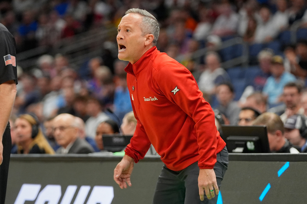 Texas Tech head coach Grant McCasland directs his team against Akron during the first half in the first round of the NCAA college basketball tournament, Friday, March 20, 2026, in Tampa, Fla. (AP Photo/John Raoux)
