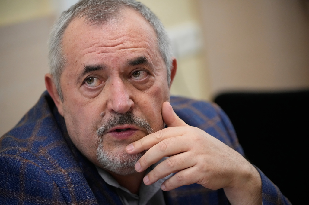 Russian politician Boris Nadezhdin, accused of displaying "extremist symbols," attends a court session in the town of Dolgoprudny outside Moscow, Russia, Friday, July 17, 2026. (AP Photo/Pavel Bednyakov)