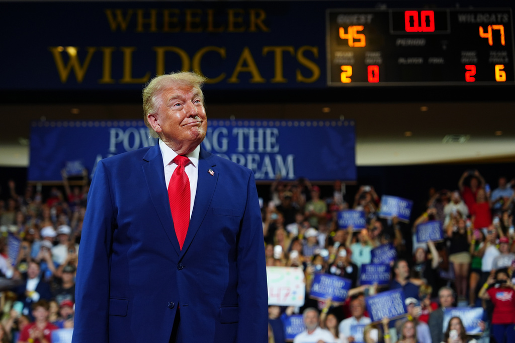 President Donald Trump appears on stage at Wheeler High School, Wednesday, July 22, 2026, in Marietta, Ga. (AP Photo/Julia Demaree Nikhinson)