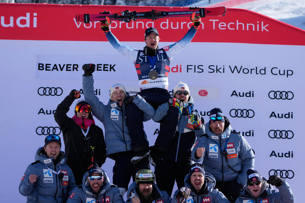 Third place finisher Norway's Adrian Smiseth Sejersted, above, celebrates with teammates after a World Cup men's downhill skiing race, Thursday, Dec. 4, 2025, in Beaver Creek, Colo. (AP Photo/John Locher)