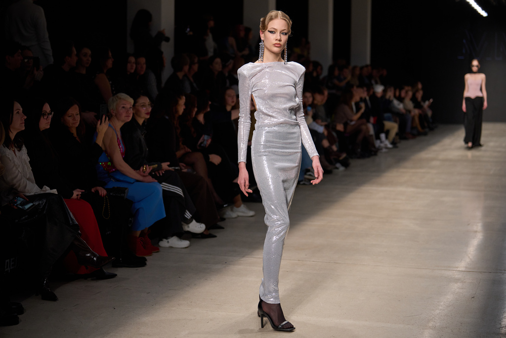 Models wear a creation by Russian brand MME on a runway at the Moscow Fashion Week in Moscow, Sunday, March 15, 2026. (AP Photo/Alexander Zemlianichenko)