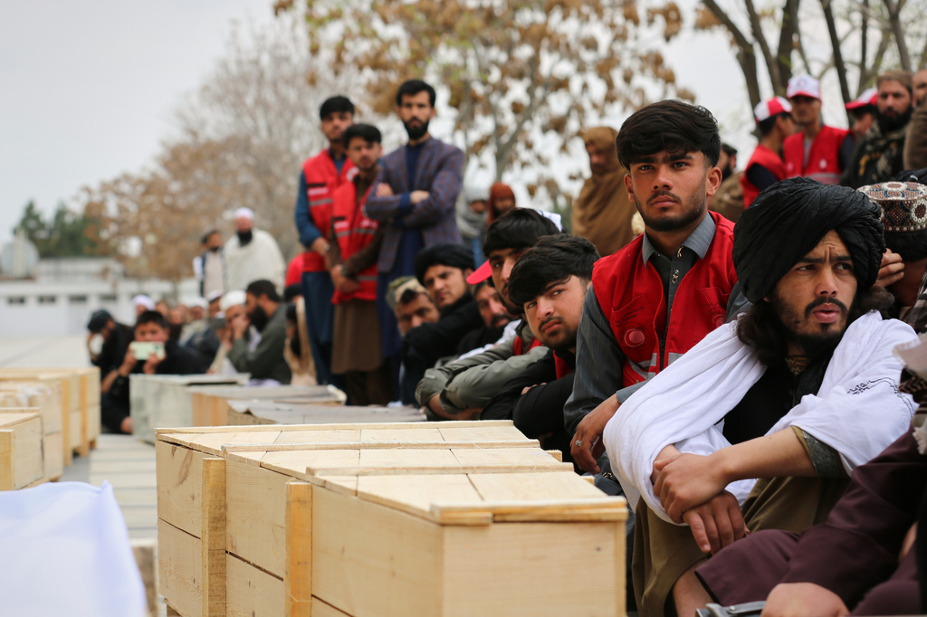 FILE - Mourners attend a second mass funeral for victims of an airstrike on a drug rehabilitation center earlier this month, in Kabul, Afghanistan, Thursday, March 26, 2026. (AP Photo/Siddiqullah Alizai, File)