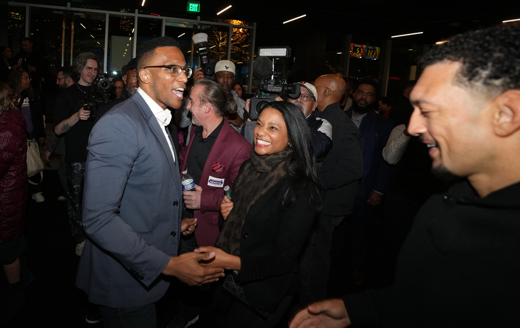 Texas Congressional Candidate Christian Menefee greets supporters during his watch party at The Post Houston on Election Day, in Houston, Saturday, Jan. 31, 2026. (AP Photo/ Karen Warren)