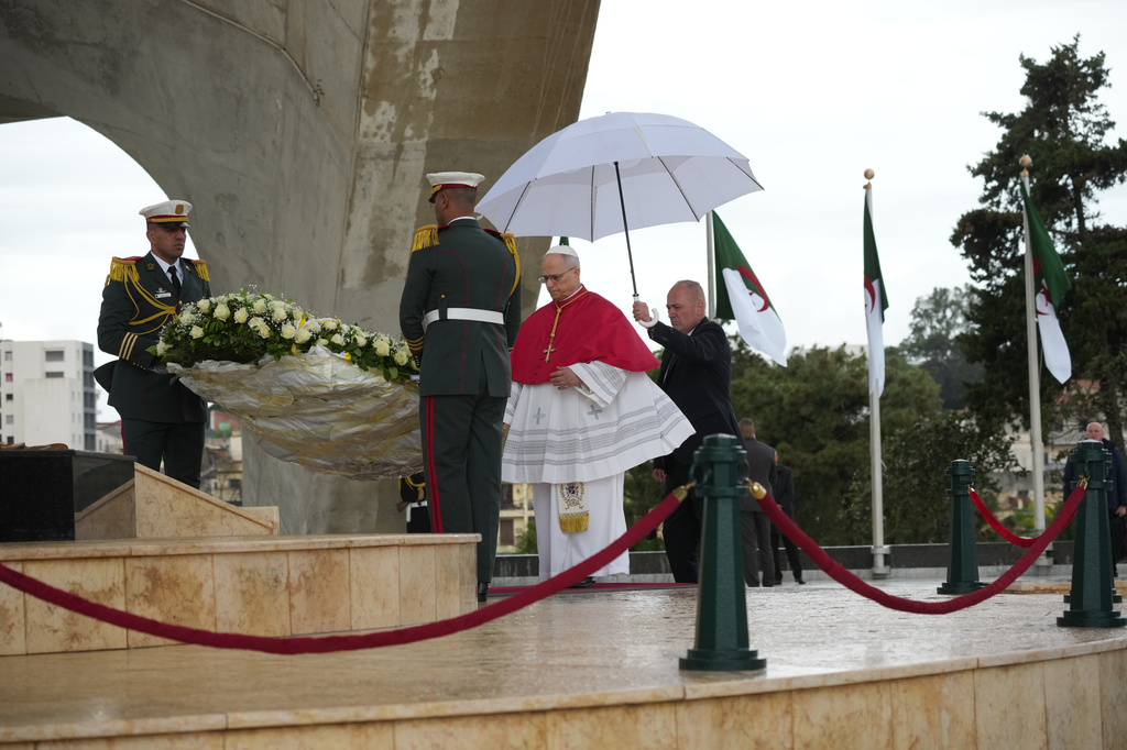 Pope Leo XIV arrives at Maqam Echahid Martyrs' Monument in Algiers, Monday, April 13, 2026, on the first day of an 11-day apostolic journey to Africa. (AP Photo/Andrew Medichini)