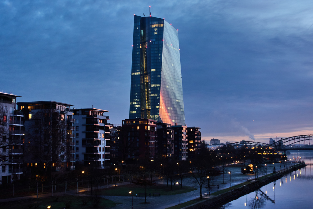 FILE - The European Central Bank is seen near the river Main in Frankfurt, Germany, early Tuesday, Dec. 9, 2025. (AP Photo/Michael Probst, File)