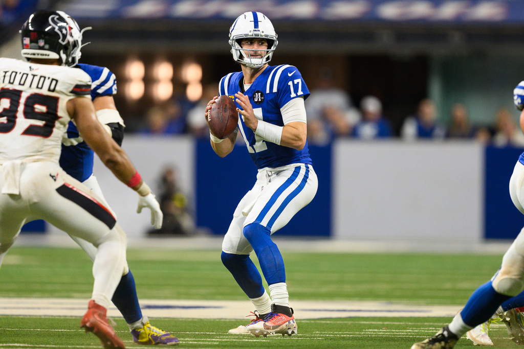 FILE - Indianapolis Colts quarterback Daniel Jones (17), wearing a special pad on his lower left leg, throws a pass during an NFL football game against the Houston Texans, Sunday, Nov. 30, 2025, in Indianapolis. (AP Photo/Zach Bolinger)