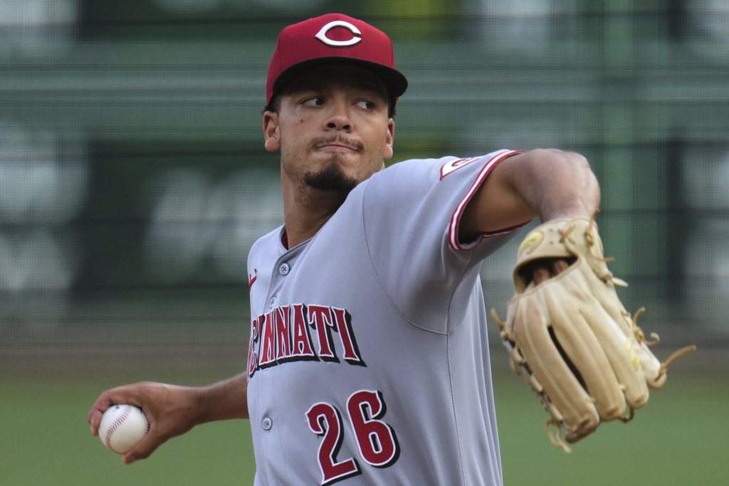 Cincinnati Reds pitcher Chase Burns delivers during the first inning of a baseball game against the Pittsburgh Pirates in Pittsburgh, Friday, Aug. 8, 2025. (AP Photo/Gene J. Puskar)