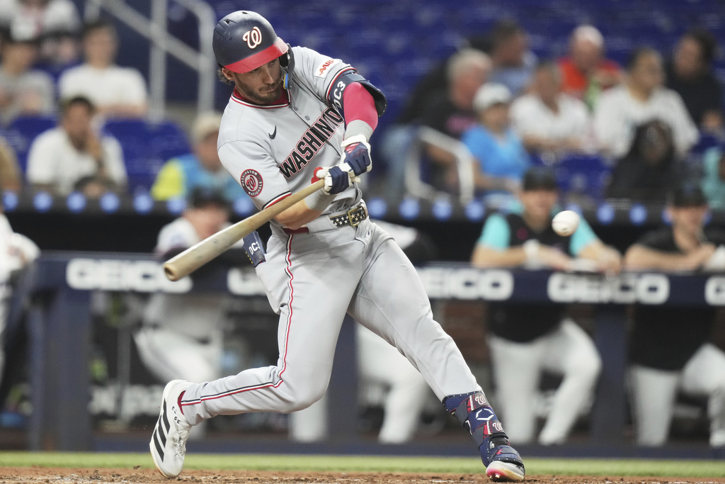Washington Nationals' Dylan Crews hits a single during the third inning of a baseball game against the Miami Marlins, Thursday, Sept. 11, 2025, in Miami. (AP Photo/Lynne Sladky)