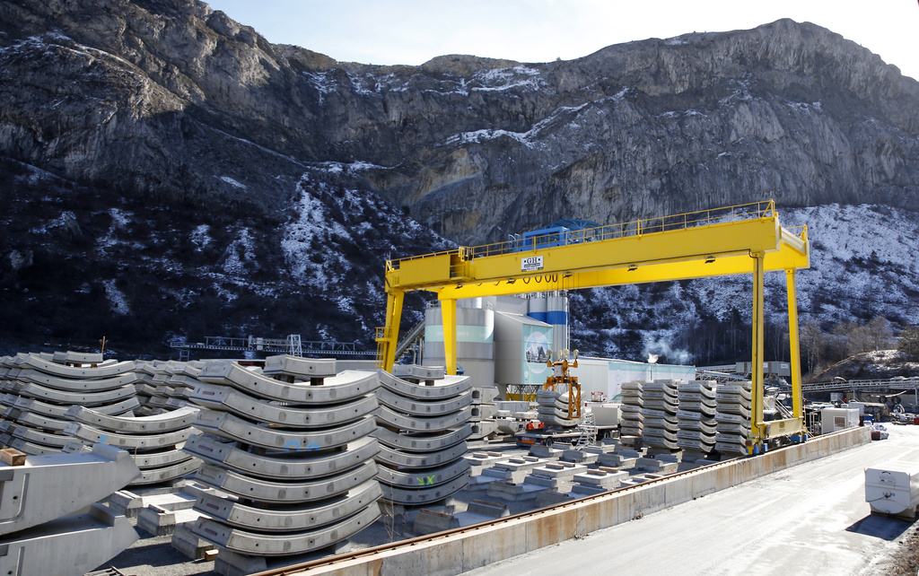 FILE - Parts of the a tunnel being built on the Turin-Lyon high-speed rail link (TAV) are piled up in Saint Martin La Porte, France, Feb. 12, 2019. (AP Photo/Antonio Calanni, File)