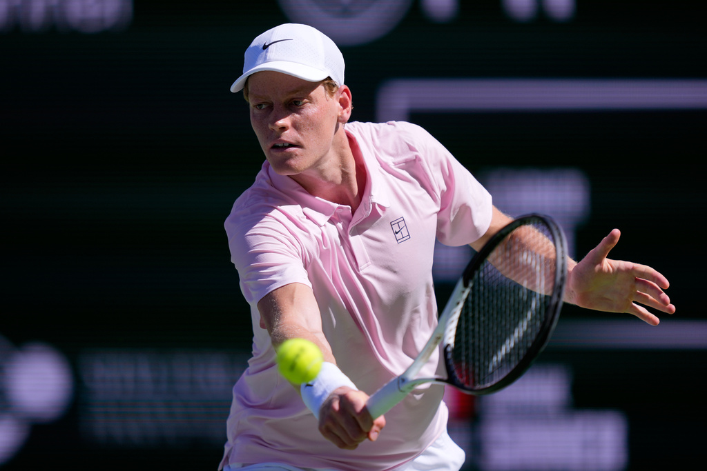 Jannik Sinner, of Italy, returns a shot against Learner Tien during a quarterfinal match at the BNP Paribas Open tennis tournament, Thursday, March 12, 2026, in Indian Wells, Calif. (AP Photo/Mark J. Terrill)