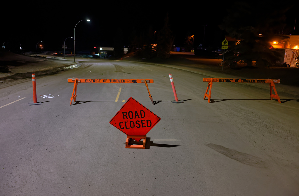 The road is blocked off before the Tumbler Ridge Secondary School, in Tumbler Ridge, B.C., Canada, on Wednesday, Feb. 11, 2026. (Jesse Boily/The Canadian Press via AP)