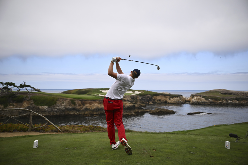 The USA team's Tommy Morrison hits from the 16th tee during Walker Cup golf matches against the Great Britain and Ireland team at Cypress Point Club on Saturday, Sept. 6, 2025, in Pebble Beach, Calif. (AP Photo/Thien-An Truong)