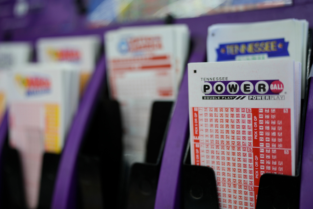 A Powerball play slip is seen at a store Wednesday, Dec. 17, 2025, in Nashville, Tenn. (AP Photo/George Walker IV)