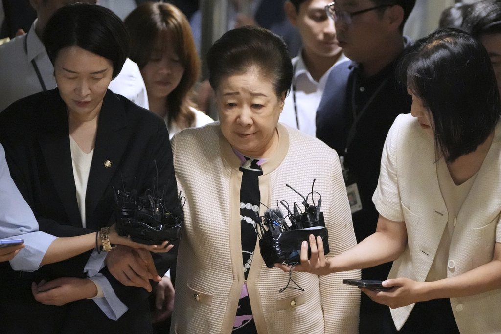 Hak Ja Han, center, the leader of South Korea's Unification Church, arrives at a special prosecutor's office in Seoul, South Korea, Wednesday, Sept. 17, 2025. (AP Photo/Lee Jin-man)