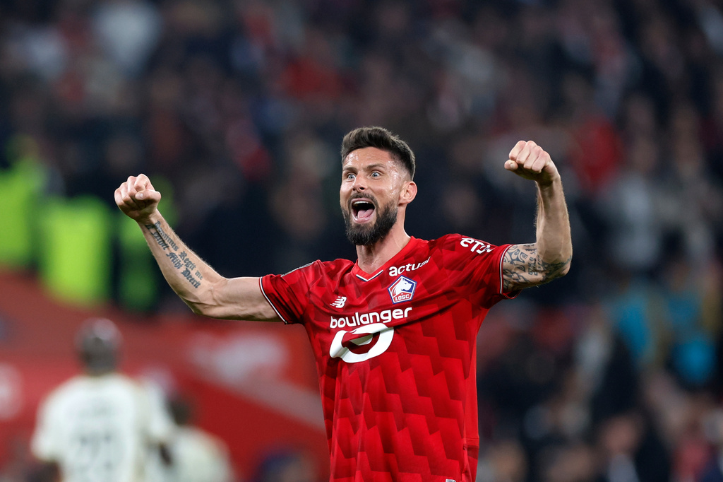 Lille's Olivier Giroud celebrates at the end of the French League One soccer match between Lille and Lens, in Lille, France, Saturday, April 4, 2026. (AP Photo/Jean-Francois Badias)