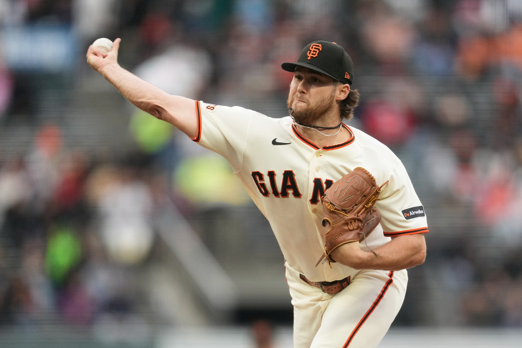 San Francisco Giants pitcher Landen Roupp throws against the Toronto Blue Jays during the first inning of a baseball game Monday, July 6, 2026, in San Francisco. (AP Photo/Jeff Chiu)
