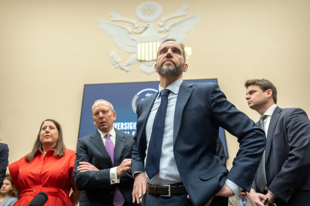 FILE - Former Justice Department special counsel Jack Smith, second from right, arrives before a hearing of the House Judiciary Committee at the Capitol in Washington, Jan. 22, 2026. (AP Photo/Mark Schiefelbein, File)