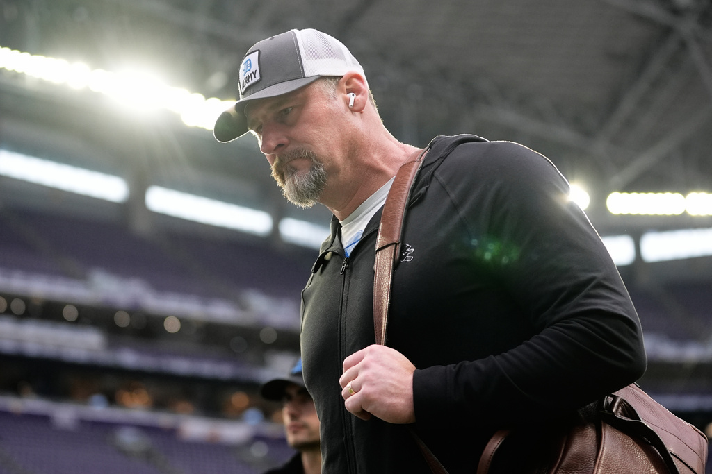 Detroit Lions head coach Dan Campbell arrives before an NFL football game against the Minnesota Vikings, Thursday, Dec. 25, 2025, in Minneapolis. (AP Photo/Abbie Parr)