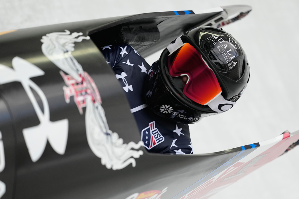 Kaillie Armbruster Humphries of the United States speeds down the track during the women's monobob race at the Bobsleigh World Cup in Innsbruck, Austria, Saturday, Nov. 29, 2025. (AP Photo/Matthias Schrader)
