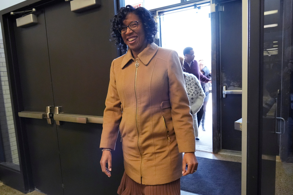 FILE - Chicago Treasurer Melissa Conyears-Ervin smiles as she walks into Marshall Metro high school to vote in Chicago, March 19, 2024. (AP Photo/Nam Y. Huh, File)