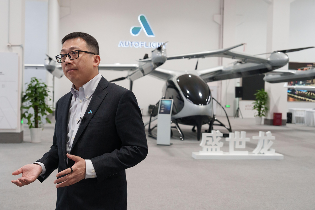 CORRECTS LOCATION Steven Yang, senior vice president of AutoFlight, speaks during an internview wtih The Associated Press in front of eVTOL aircraft in Kunshan city in China's Jiangsu province, on Feb. 24, 2026. (AP Photo/Vincent Thian)