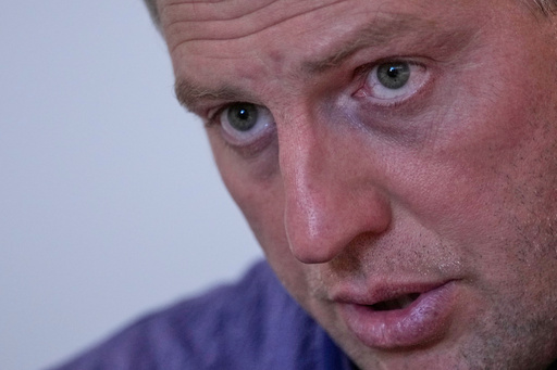 FILE - Vladimir Osechkin speaks during an interview with The Associated Press in Paris, France, Tuesday, Sept. 20, 2022. (AP Photo/Francois Mori, File) FILE - Vladimir Osechkin speaks during an interview with The Associated Press in Paris, France, Tuesday, Sept. 20, 2022. (AP Photo/Francois Mori, File)