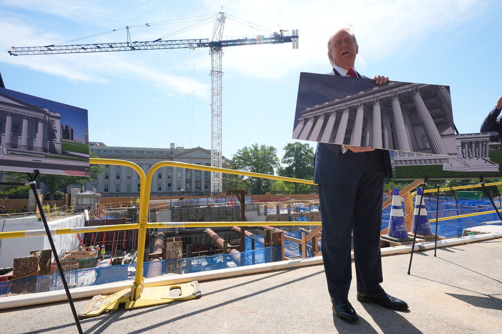 President Donald Trump speaks as he tours Ballroom construction around the outside the White House, Tuesday, May 19, 2026, in Washington. (AP Photo/Jacquelyn Martin)