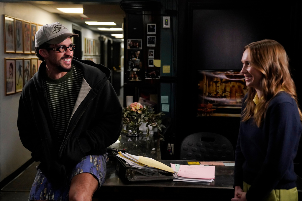 This image released by NBC shows actor-singer Bad Bunny, left, and new cast member Veronika Slowikowska backstage on Sept. 30, 2025, as they film promotional spots for this week's "Saturday Night Live" episode in New York. (Rosalind O'Connor/NBC via AP)