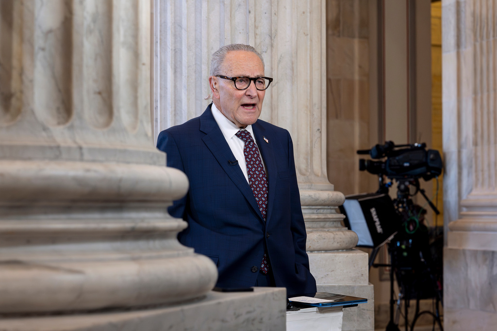 Senate Minority Leader Chuck Schumer, D-N.Y., speaks during a TV news interview at the Capitol in Washington, early Feb. 5, 2026. (AP Photo/J. Scott Applewhite)