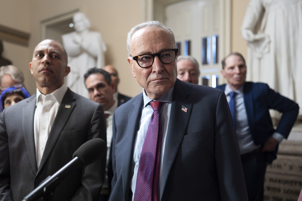House Democratic Leader Hakeem Jeffries, left, and Senate Democratic Leader Chuck Schumer, both of New York, tell reporters that they are united as the Sept. 30 funding deadline approaches, at the Capitol in Washington, Thursday, Sept. 11, 2025. (AP Photo/J. Scott Applewhite)