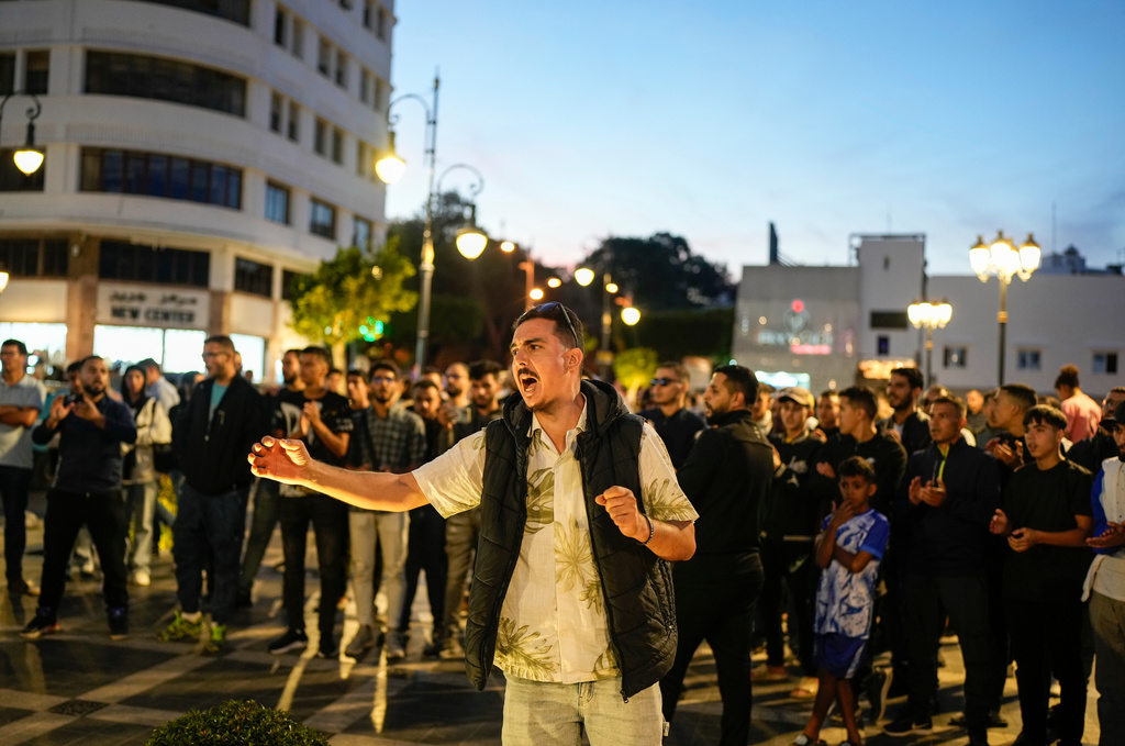 People take part in a youth led protest calling for education and healthcare reforms, in Tangier, Morocco, Saturday, Oct. 18, 2025. (AP Photo/Mosa'ab Elshamy)