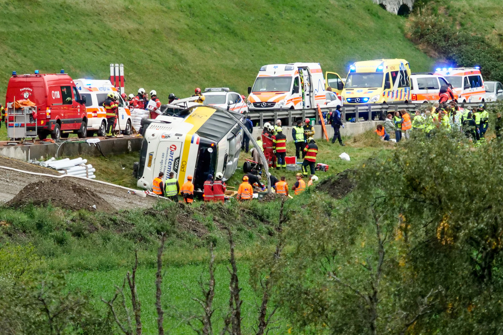 Emergency personnel respond to an accident involving a tour bus near Susch, in the canton of Grisons, Switzerland, on Thursday, Sept. 10, 2026. (Jon Duschletta/Engadiner Post/Keystone via AP)