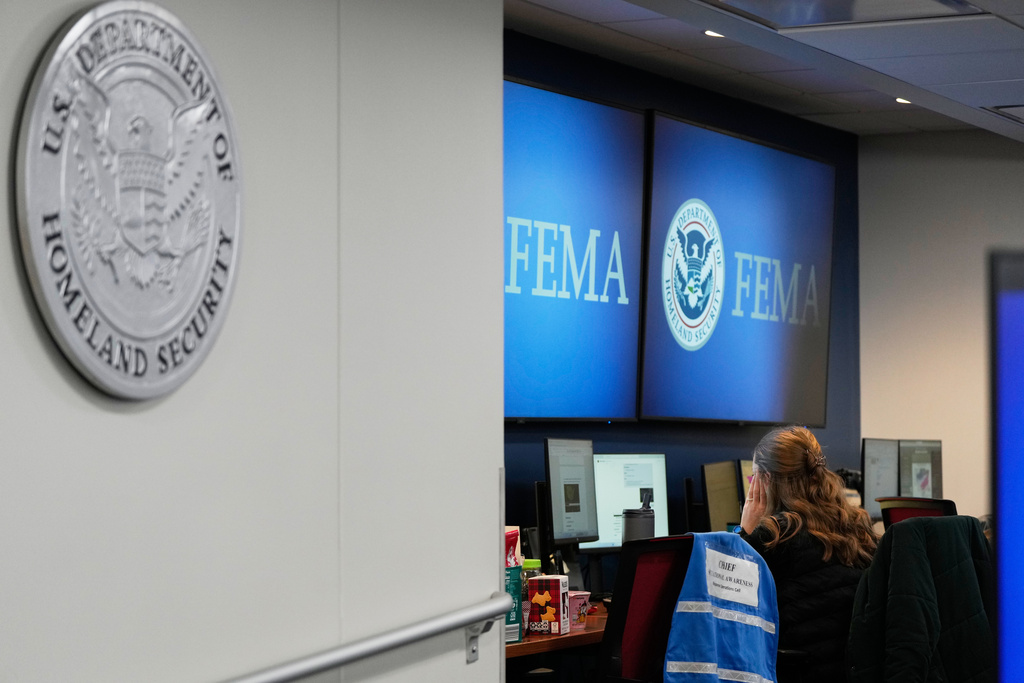 A person works at Federal Emergency Management Agency headquarters Saturday, Jan. 24, 2026, in Washington. (AP Photo/Julia Demaree Nikhinson)