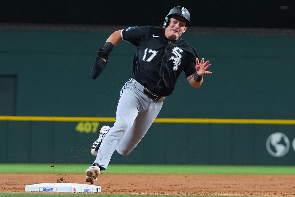 Chicago White Sox's Sam Antonacci rounds third base on his way to score on a double by Miguel Vargas during the third inning of a baseball game against the Texas Rangers, Monday, July 20, 2026, in Arlington, Texas. (AP Photo/LM Otero)