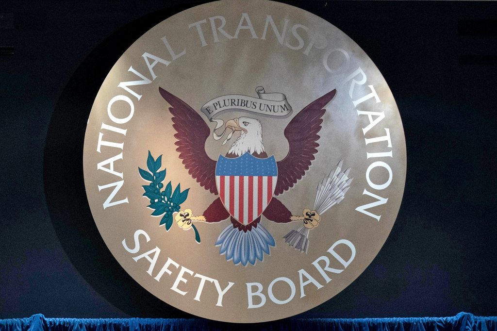 FILE - National Transportation Safety Board emblem is seen in the National Transportation and Safety Board boardroom in Washington, Jan. 27, 2026. (AP Photo/Jose Luis Magana, File)