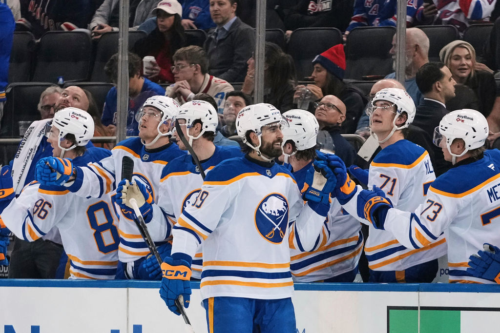 Buffalo Sabres' Alex Tuch (89) celebrates with teammates after scoring a goal during the second period of an NHL hockey game against the New York Rangers Thursday, Jan. 8, 2026, in New York. (AP Photo/Frank Franklin II)