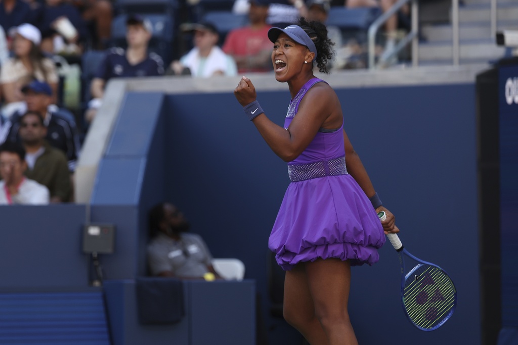Naomi Osaka, of Japan, reacts to a pont against Daria Kasatkina, of Australia, during the third round of the U.S. Open tennis championships, Saturday, Aug. 30, 2025, in New York. (AP Photo/Heather Khalifa)