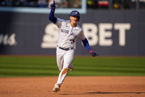 FILE - Toronto Blue Jays' Matt Chapman celebrates after his walkoff double against the Boston Red Sox during ninth-inning baseball game in Toronto, Sunday, Sept. 17, 2023. Chapman and the San Francisco Giants have agreed to a $54 million, three-year contract, a person familiar with the negotiations told The Associated Press, Saturday, March 2, 2024. (Andrew Lahodynskyj/The Canadian Press via AP, File)