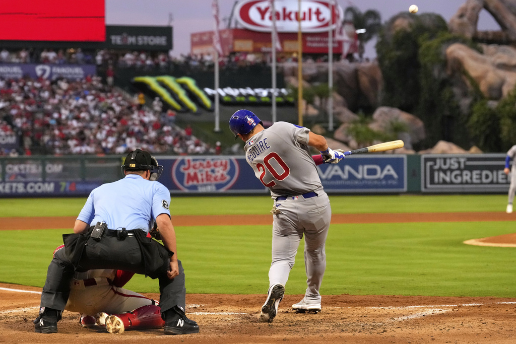 Chicago Cubs' Reese McGuire hits a grand slam during the fourth inning of a baseball game against the Los Angeles Angels, Saturday, Aug. 23, 2025, in Anaheim, Calif. (AP Photo/Mark J. Terrill)