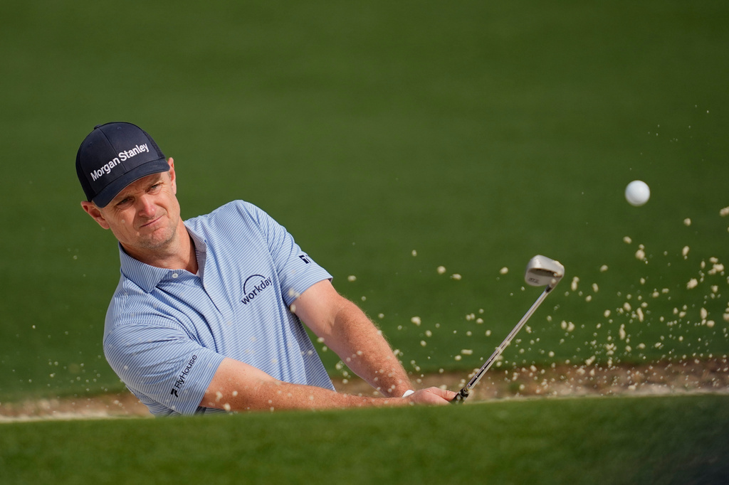 Justin Rose, of England, hits from the bunker on the second hole during a practice round at of the Masters golf tournament at the Augusta National Golf Club, Monday, April 6, 2026, in Augusta, Ga. (AP Photo/Ashley Landis)
